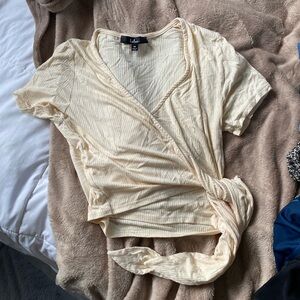 Lulu's Light Cream Short Sleeve Wrap Top